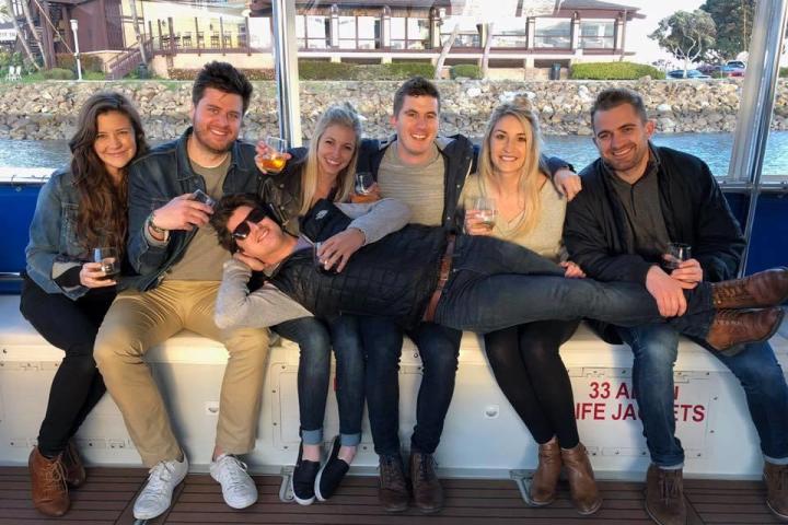 a group of people sitting posing for the camera